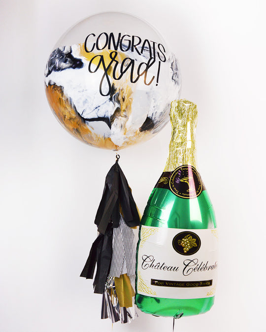 Bouquet Burbuja Gigante + Champagne Bottle Balloon